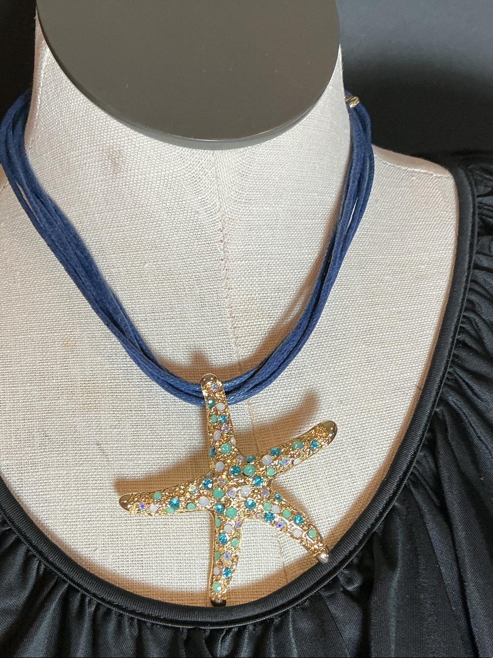 Gold Starfish Pendant Necklace with Blue Multi-Strand Cord